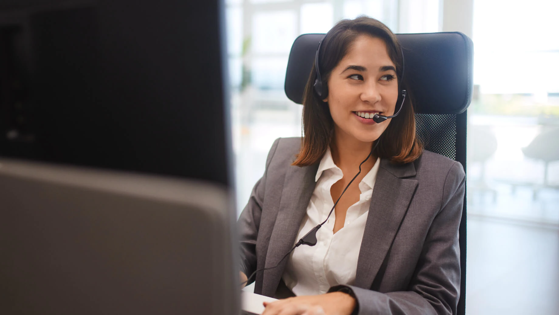 Female Carlton rep on headset